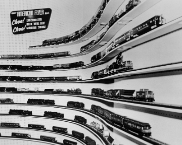 Train display shelves near the front of the store.