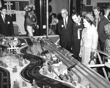 1963 Display - Connecticut Governor John Dempsey and Mrs Dempsey at the Gilbert Display at the Eastern States Exposition. The stockyard, an unlikely item to be featured in a 1963 layout, is seen clearly in this photo. If you look carefully in the photo of the overall view of the display, you can see it at the front center.