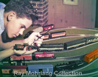 Boy Working on HO Trains