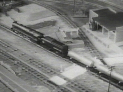 Freight Station At the upper right, this view shows an earlier location of the freight station that was apparently moved under the Erector girder crossover at the right end of the layout by the time the Buckage photos were taken.