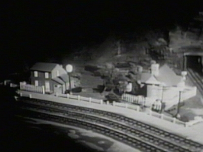 Left Tunnel Area at Night This night view shows the small residential area near the tracks that gave way for the circus area shown on the Buckage photos.