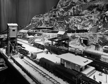 Rolling stock and accessories shown here are typical of 1949.