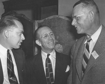 Herman Trisch (right) and two others