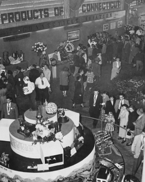 1952 Display - This appears to be the same display that appeared earlier in 1952 at "Industry's Open House" at the Goffe Street Armory in New Haven. The arrangement of the items on the display is slightly different but it is essentially the same display. This shot was definitely taken at the Eastern States Exposition as that venue's signature draperies and tall pillars are clearly present.