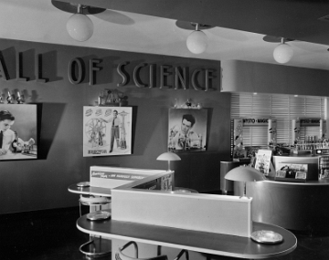 Although Bruce Manson, in his first Train Collector's Quarterly article cited on the New York Hall of Science page, identifies this photo and another as being taken on 4th floor, the lighting fixtures and the items displayed are more indicative of the 3rd floor wholesale toy division displays. Another photo in that article of what appears to be this same area is identified as a third floor view.